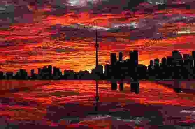 A Stunning Sunset Over Toronto, With The City Skyline Silhouetted Against The Golden Sky. Sunset In Toronto: Poems Victoria West