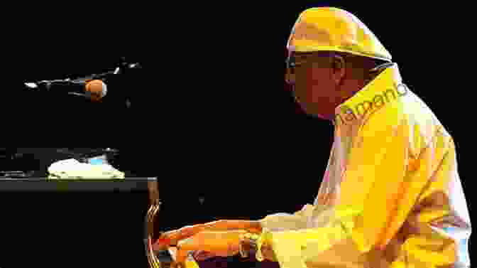 Chucho Valdés Playing The Piano In A Concert Hall, His Fingers Dancing Across The Keys Beyond Buena Vista: Contemporary Cuban Song (Cuban Beat 1)