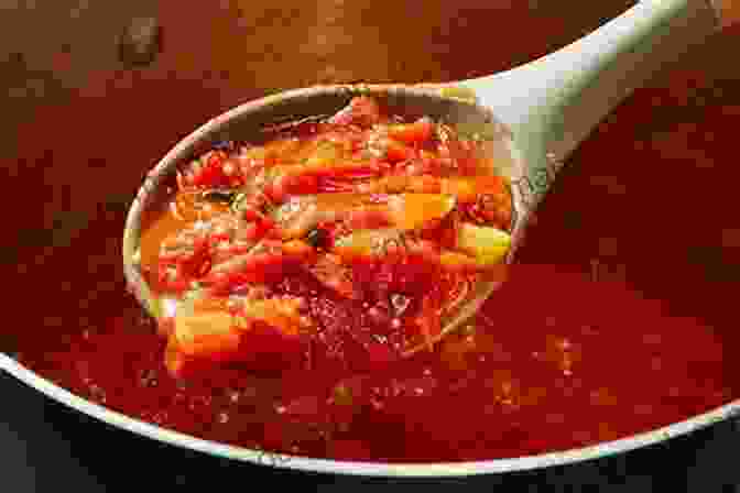 Image Of A Pot Filled With A Rich, Flavorful Tomato Sauce Bubbling On The Stove A Complete Guide To Pizza Cookbook With 150+ Easy Delicious Pizza Recipes For Everyone